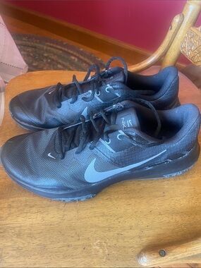 Nike Black Athletic Training Shoes with Grey Swoosh